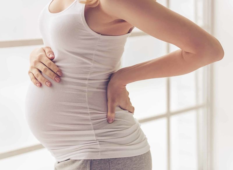 Bệnh thoát vị đĩa đệm sẽ gây khó khăn cho mẹ bầu trong thời gian mang thai và khi sinh sản 